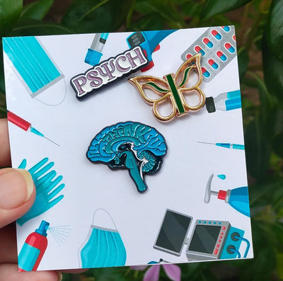 PSI Brooch